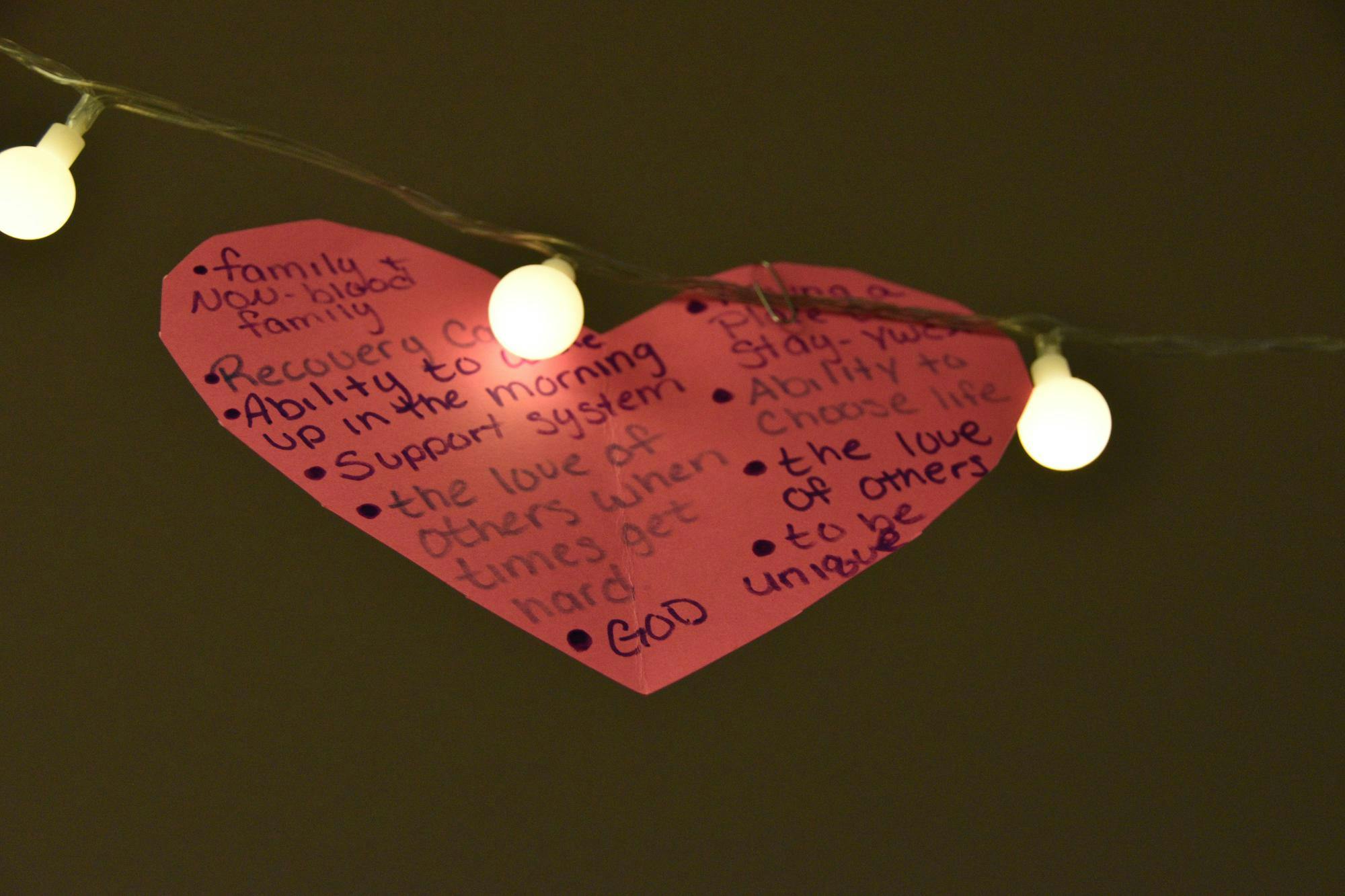 A heart hangs from the lights at the Recovery Cafe Feb. 2. in Muncie, Indiana. RCM aids anyone in need of recovery from anything. Ella Howell, DN