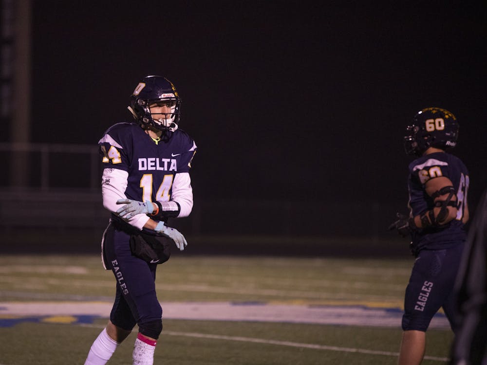 Eagles' senior wide receiver and cornerback Carson Neu walks off the field during Delta's game vs. Wayne Oct. 30, 2020, at Delta High School. The Eagles defeated the Generals 49-18. Connor Smith, DN.