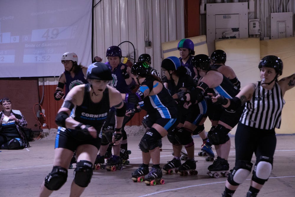 A jammer from Cornfed Roller Derby All-Stars makes her way around the circle Feb. 18. There is one jammer from each team during each jam, or round, of roller derby. Elissa Maudlin, DN.