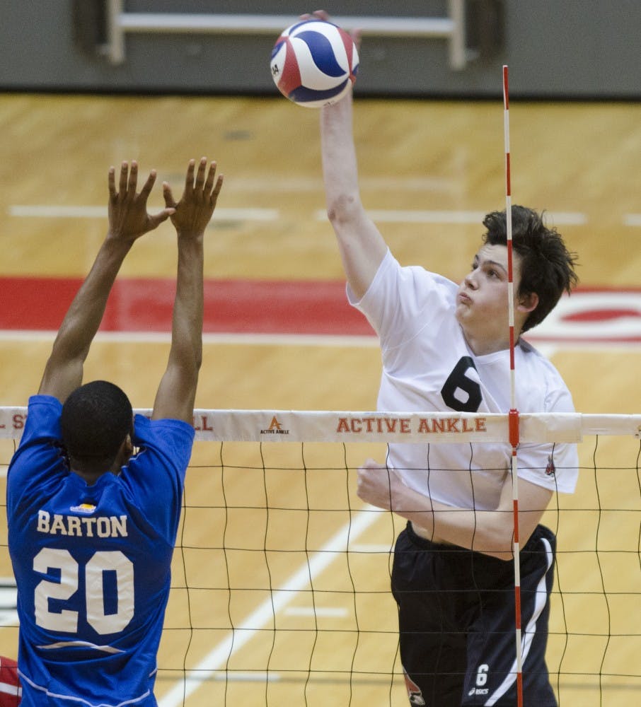 Freshman outside attacker Brendan Surane hits the ball over the net in match against Barton on Feb. 28 at Worthen Arena. Surane had 10 kills. DN PHOTO BREANNA DAUGHERTY 