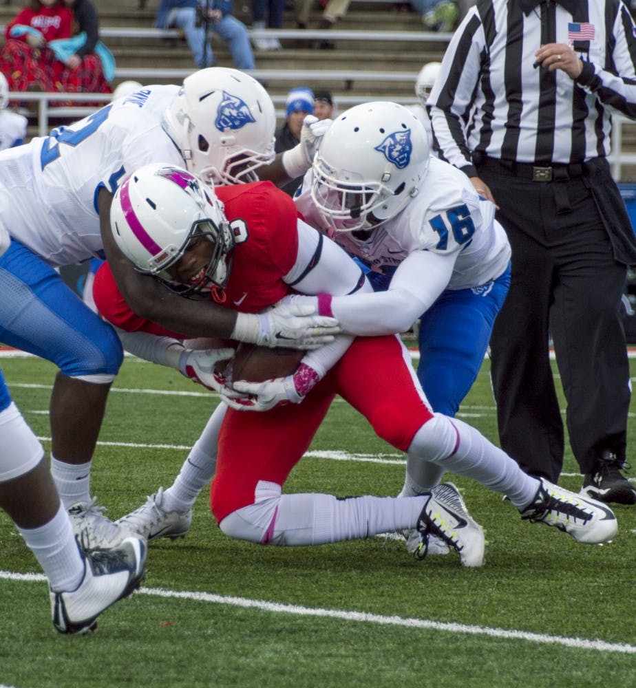 Senior wide receiver Jordan Williams gets tackled during the football game against Georgia State on Oct. 17 at Scheumann Stadium. DN PHOTO ALAINA JAYE HALSEY