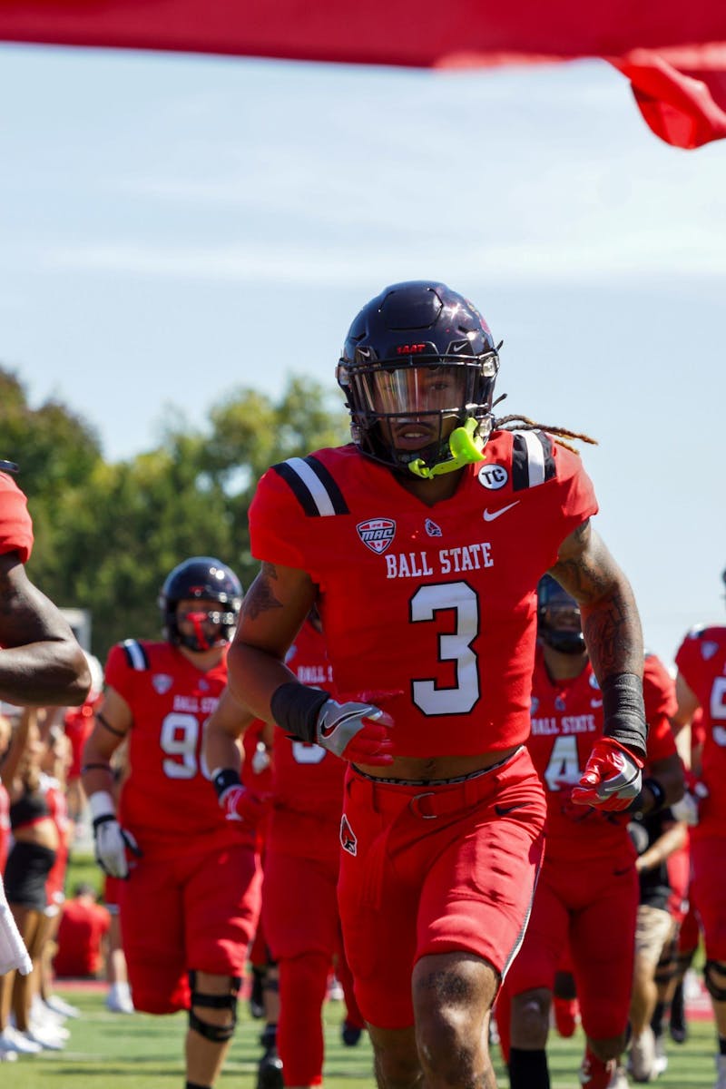 Junior defensive back Jordan Riley runs out with his team before Ball State Football played Georgia Southern Sept. 23 at Scheumann Stadium. The Cardinals fell 40-3. Daniel Kehn, DN