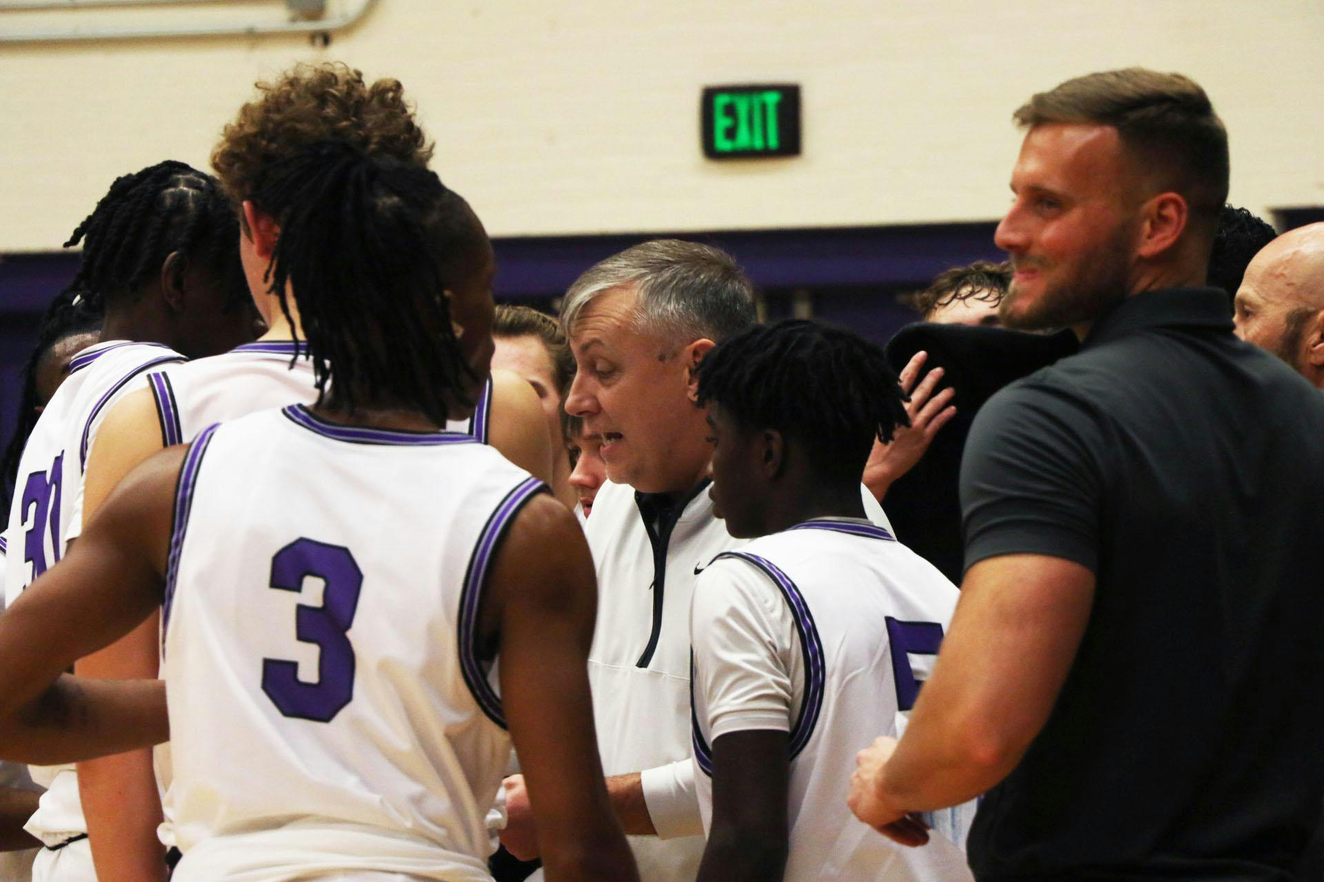 Muncie Central head coach Justin Ullom talks to the Bearcats Nov. 21 against Wapahani at the Muncie Central Fieldhouse. Zach Carter, DN.