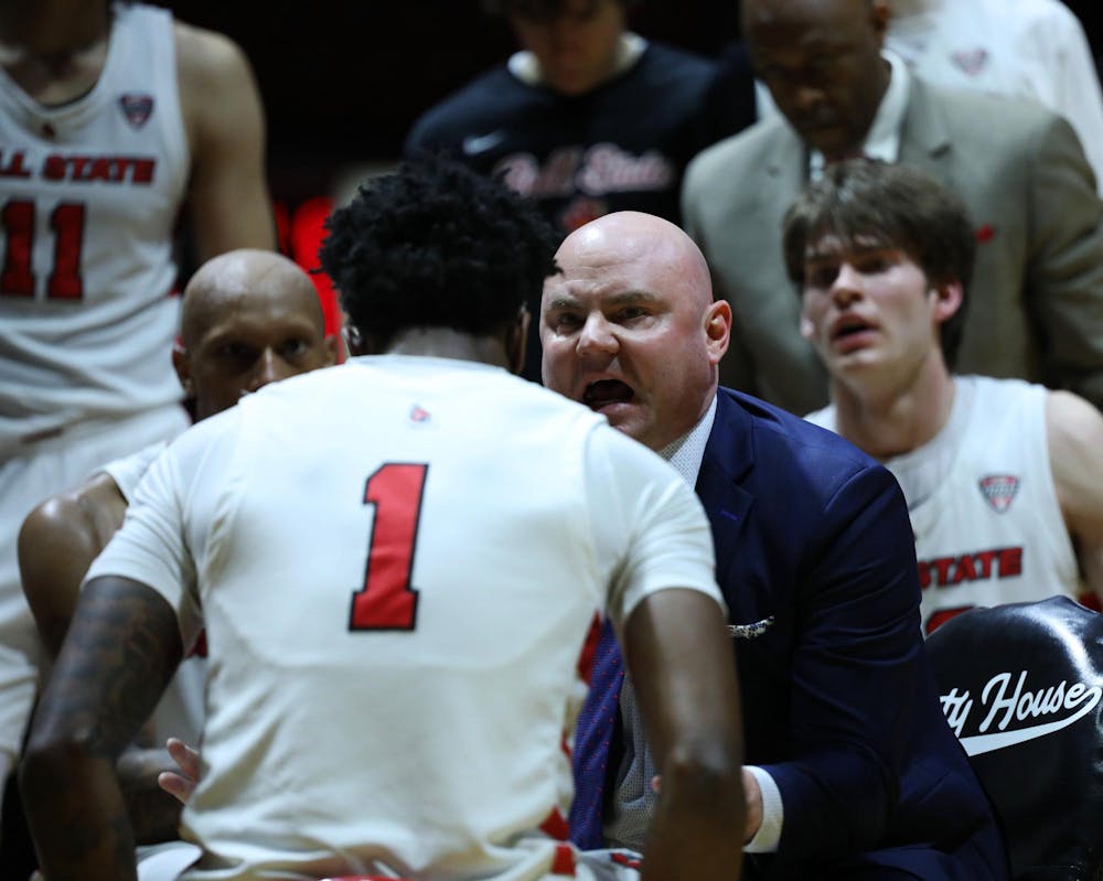 Ball State men's basketball head coach Michael Lewis talks to Junior guard Jalin Anderson during a time out against Ohio Feb. 6 at Worthen Arena. The Cardinals lost 84-79 to the Bobcats. Mya Cataline, DN