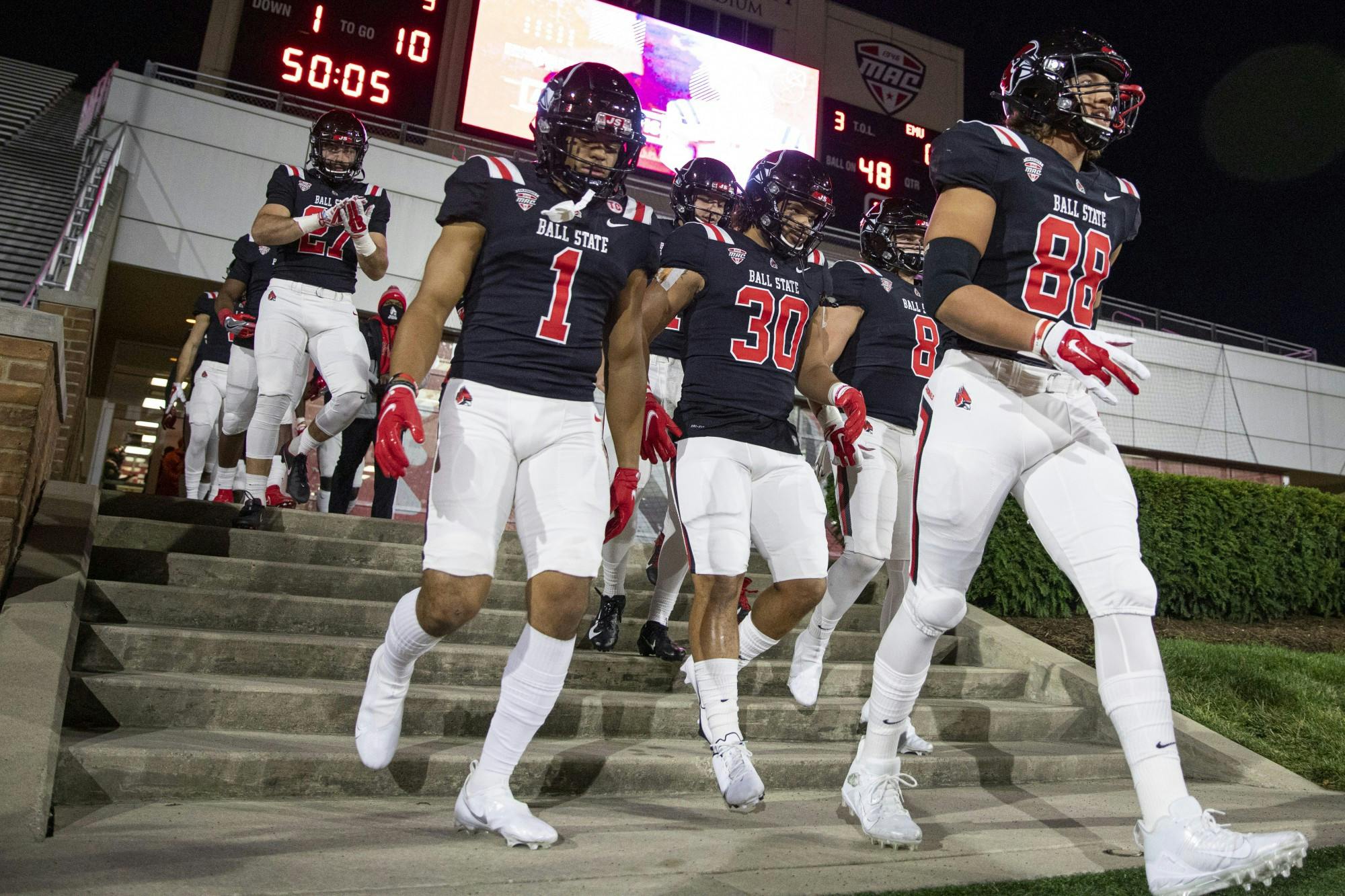 The offense walks out of the locker room before walking out to take on the Eastern Michigan Eagles Nov. 11, 2020, at Scheumann Stadium. The Cardinals beat the Eagles 38-31. Jacob Musselman, DN