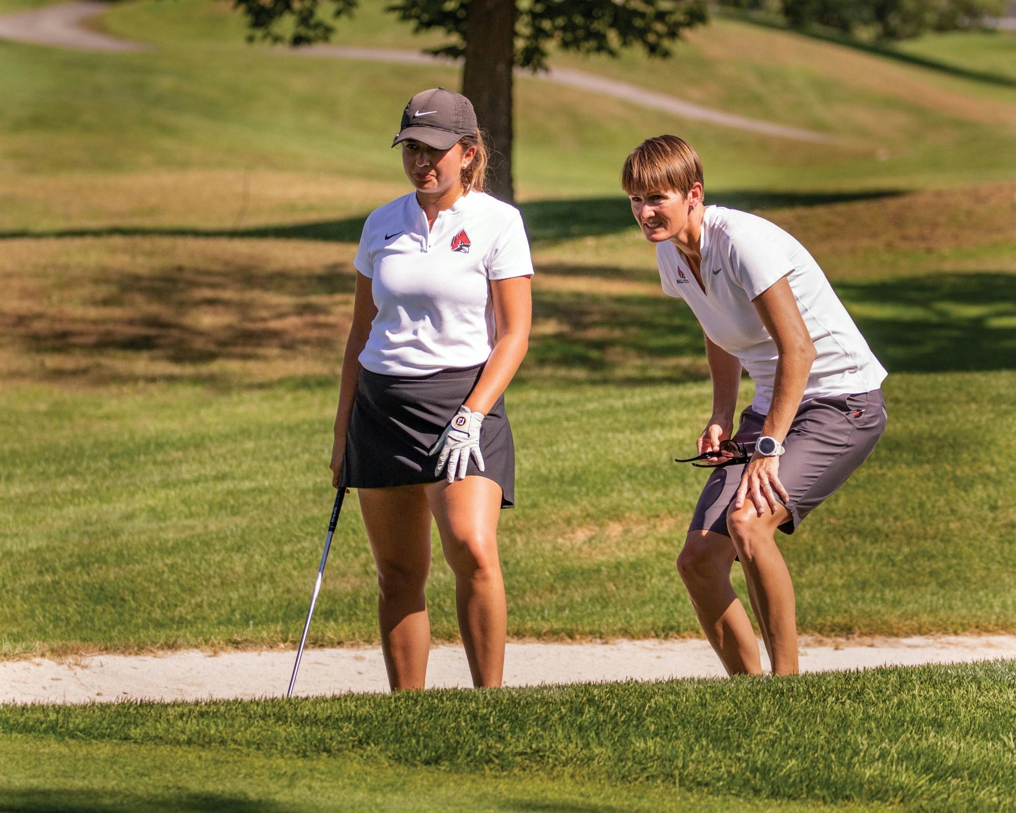Senior Manon Tounalom (left) stands next to Head Coach Katherine Mowat (right) Feb. 6, 2019 at the Sunshine Invitational in Dade City, Fla. Ball State University Creative Services Photo Courtesy