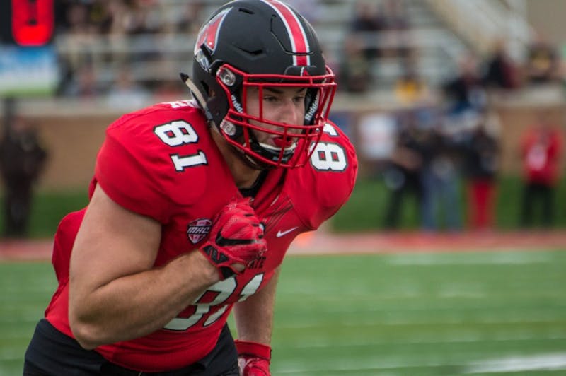 Ball State tight end Kyle Schrank lines up for the snap during the game against Northern Illinois on Oct. 1 in Scheumann Stadium. On Saturday afternoon, football head coach Mike Neu and the Ball State Cardinals open the 2017 season with a road trip to Illinois. Grace Ramey, DN File