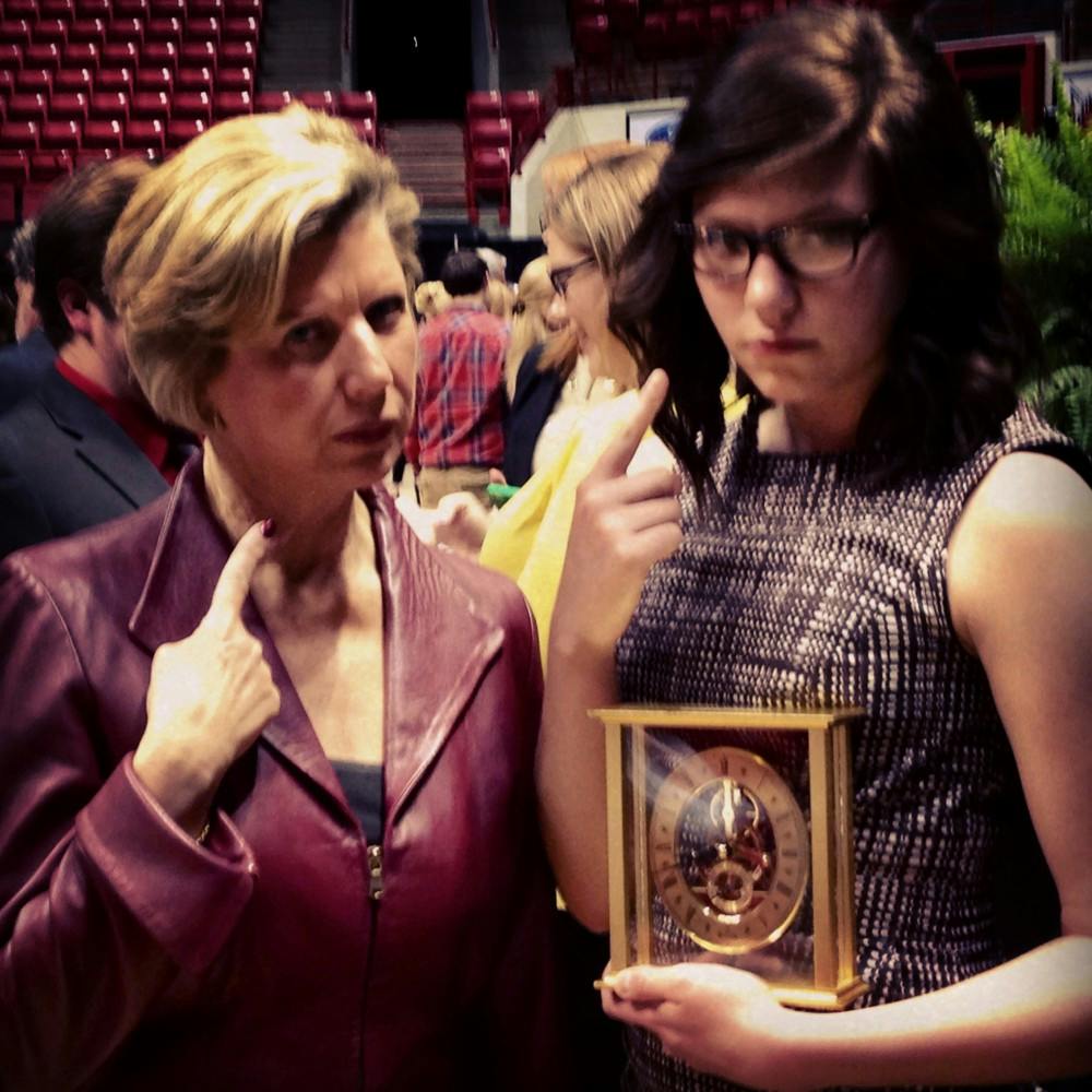 Junior psychology major Berkley Conner poses with President Jo Ann Gora after Conner received the James Marine Outstanding Junior Scholarship at the Senior Recognition banquet. The Speech Team nominated her for the award. Gora posed with her to show her support for Conner