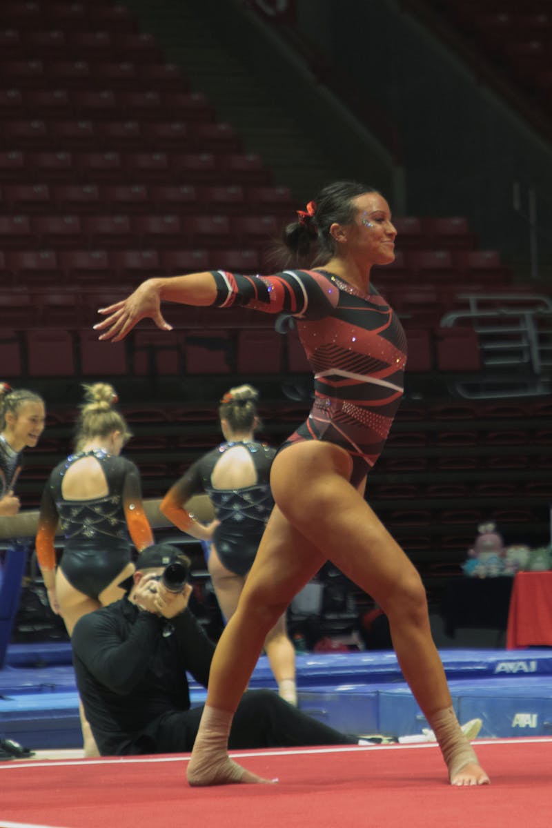 Junior Carissa Martinez momentarily stands at the corner for her floor routine against Bowling Green Jan. 22 at Worthen Arena. Martinez scored a 9.100 on the floor. Kate Tilbury, DN