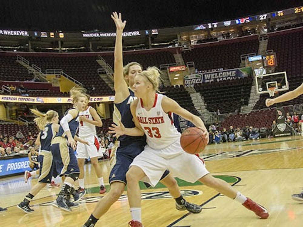 Katie Murphy attempts a layup to score for Ball State.  DN PHOTO COREY OHLENKAMP