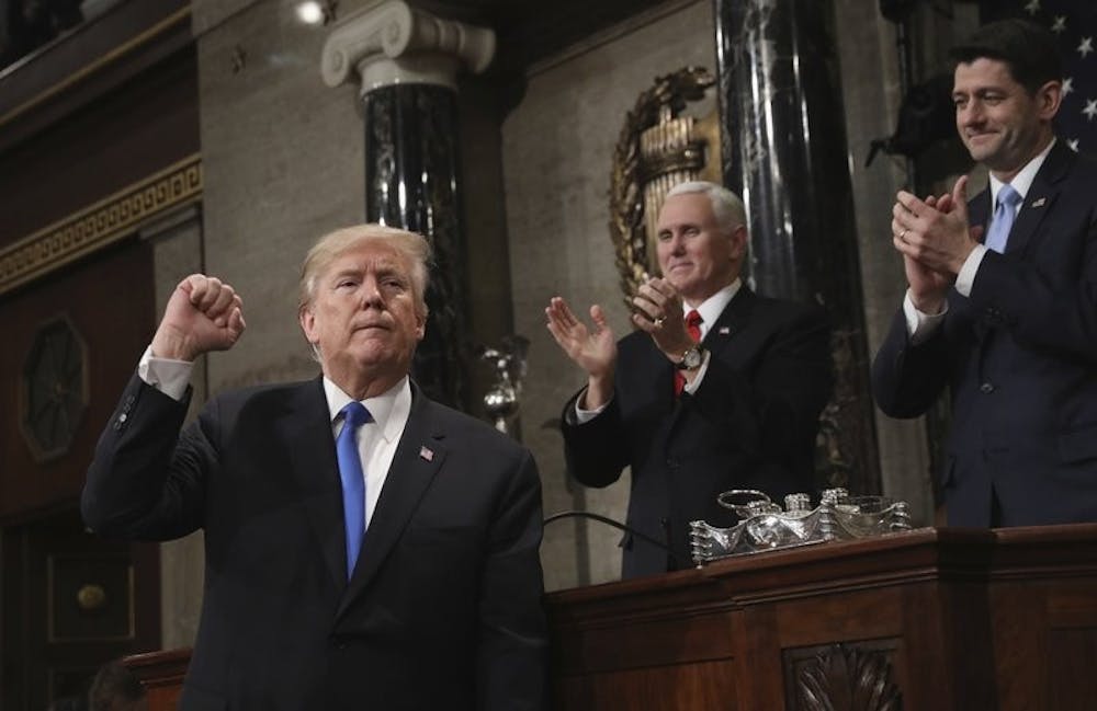 <p>President Trump gestures as he finishes his first State of the Union address in the House chamber of the U.S. Capitol to a join session of Congress Tuesday, Jan. 30, 2018, in Washington, as Vice President Mike Pence and and House Speaker Paul Ryan applaud. <strong>Associated Press</strong></p>