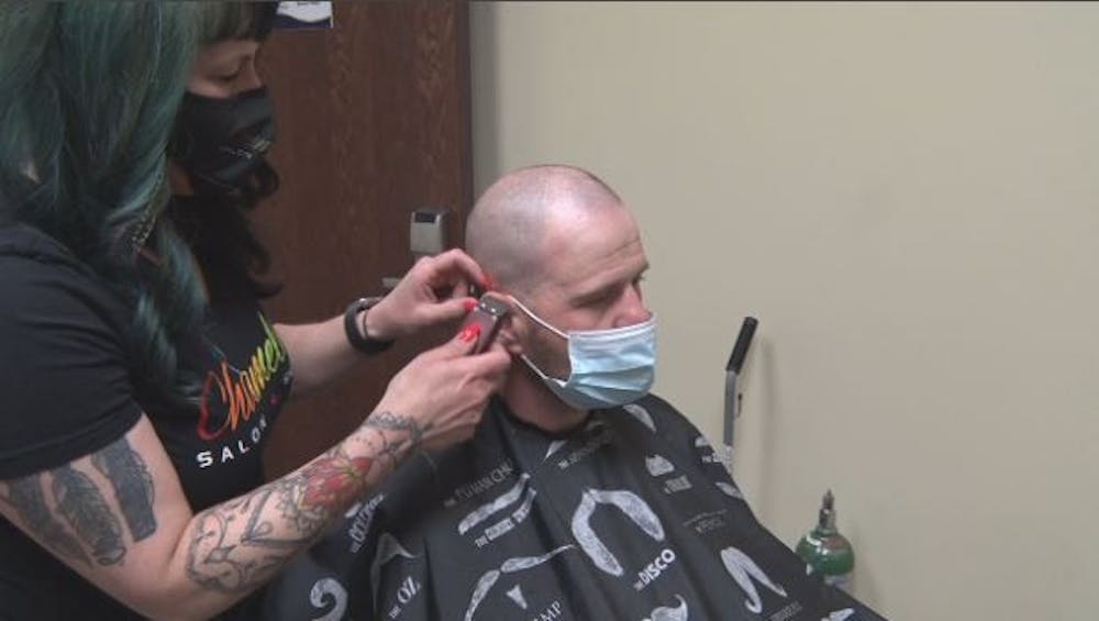 Salon owner gives back to Muncie Mission residents