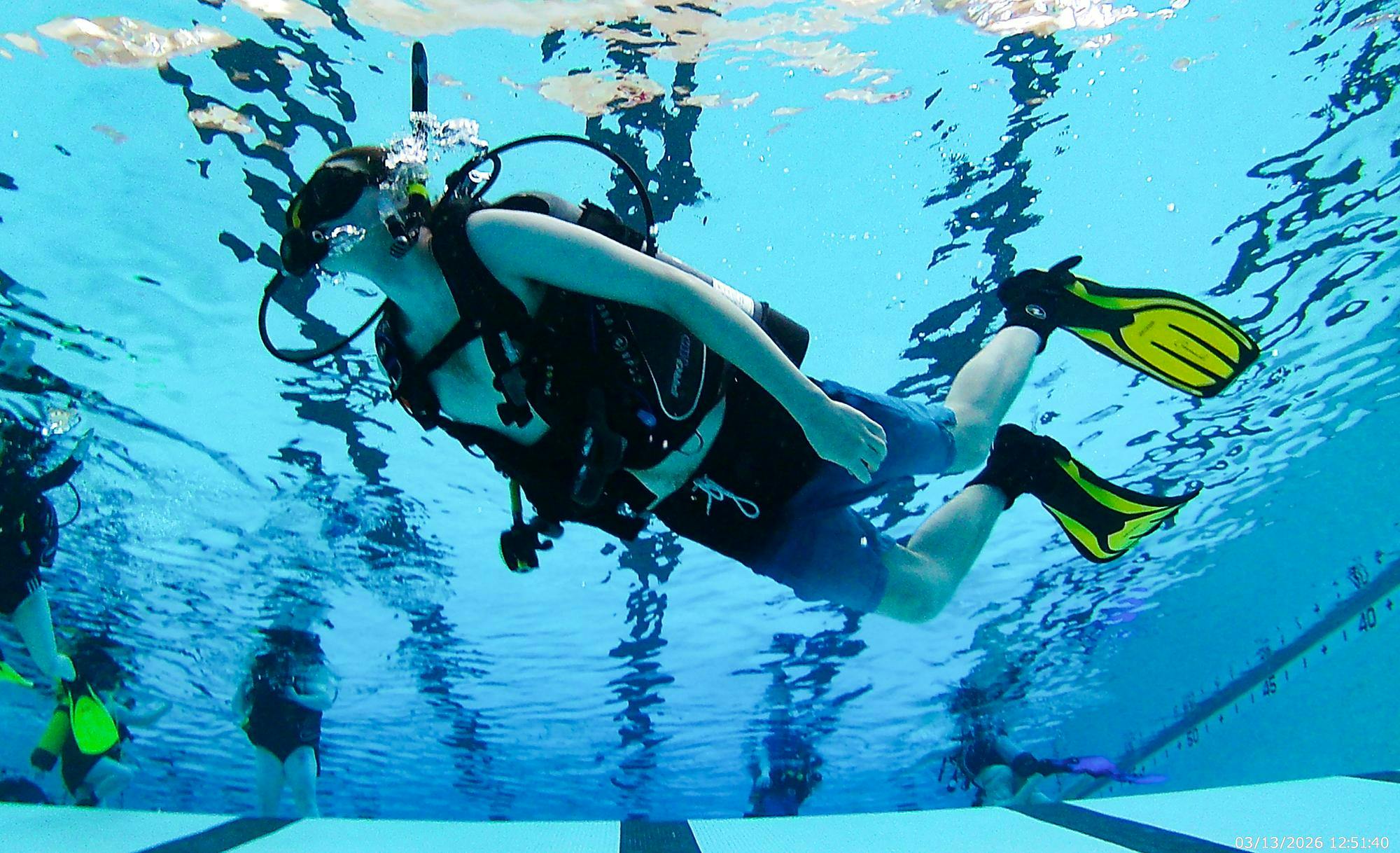 A member of AQUA 220 at Ball State University is photographed  March 13 at Ball Gymnasium. Isabella Kemper, Ball Bearings.