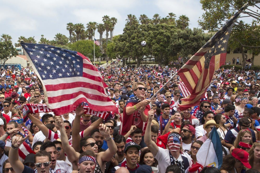USA fans cheer at Redondo Beach Pier in Los Angeles on Tuesday July 1, 2014, before Team USA takes on Belgium in the World Cup. (Jabin Botsford/Los Angeles Times/MCT)