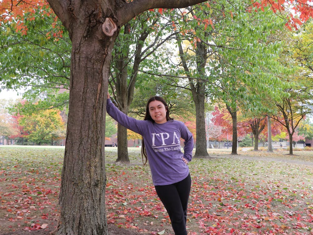 President of Nu Chapter of Gamma Rho Lambda Audrey Schockett poses for a photo Oct. 12 next to a tree at Ball State. Grayson Joslin, DN