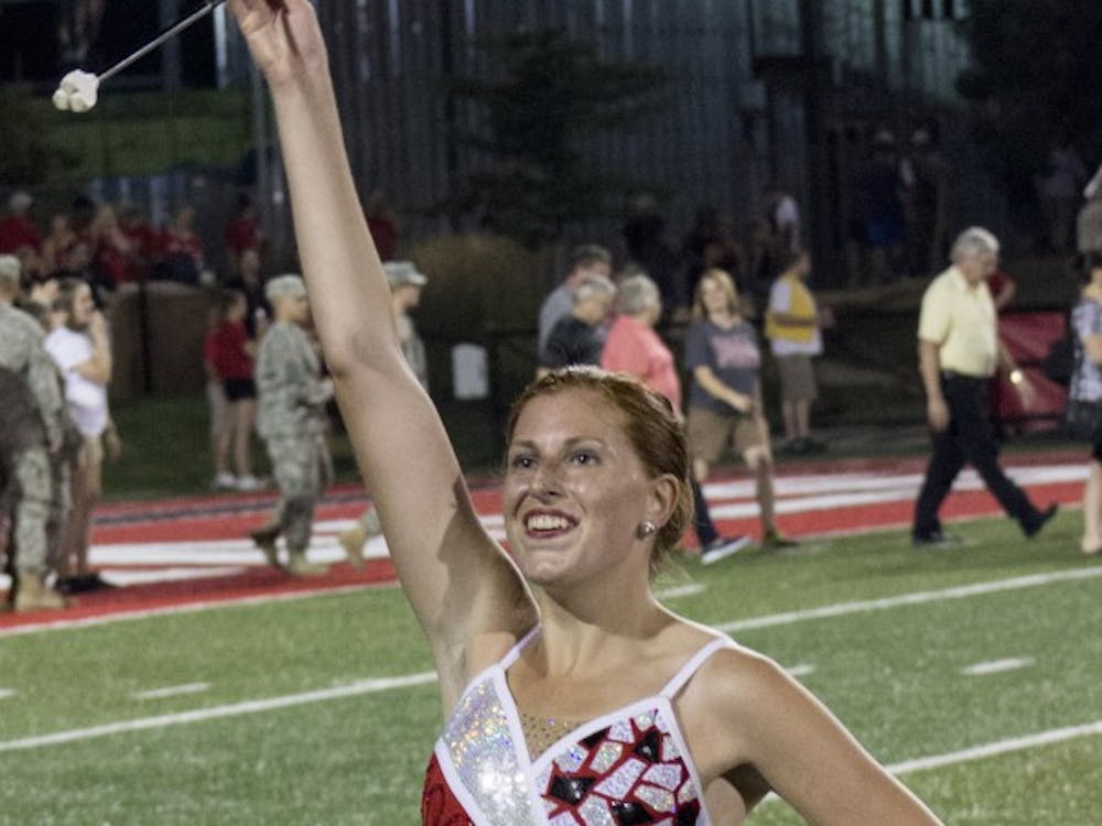 A member of the Pride of Mid-America finishes her performance during the football game against Virginia Military Institute on Sept. 3 at Schuemann Stadium DN PHOTO MAKAYLA JOHNSON