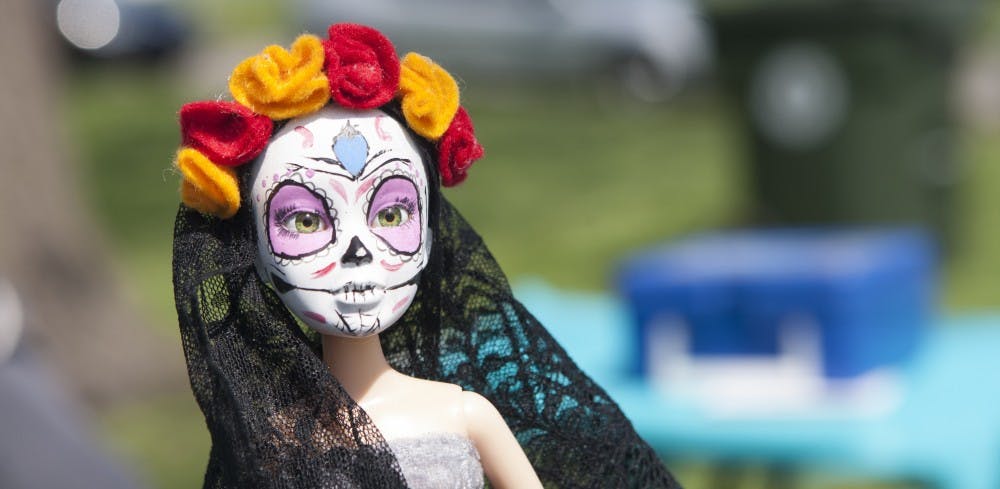 Heekin Park was host to a verity of people selling handmade creations, including this customized doll, on May 17. The doll was one of many crafts available for sale that included decor, toys, clothing and jewelry. DN PHOTO JORDAN HUFFER
