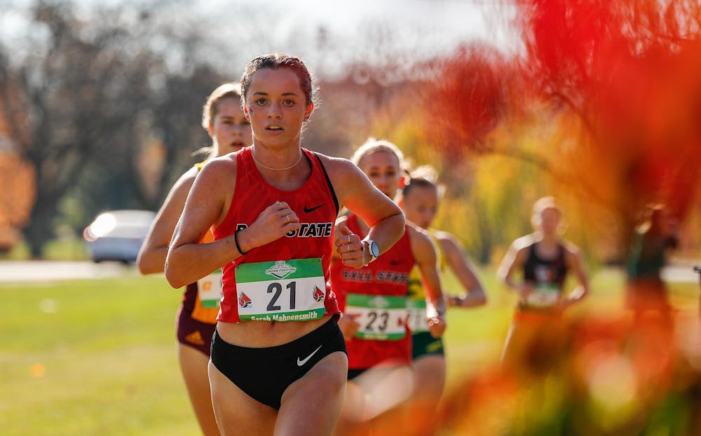 <p>Senior Sarah Mahnensmith runs during the Mid-American Conference Cross Country tournament Nov. 2 hosted at Ball State University. Andrew Berger, DN </p>