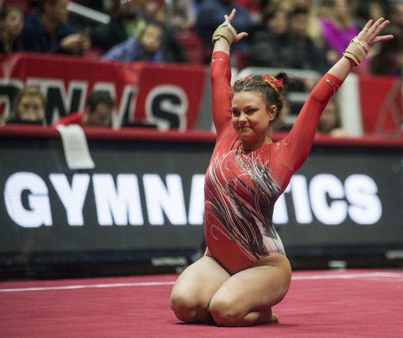 Senior Kayla Beckler strikes a pose during her floor routine during the meet against Kentucky Jan. 29 at John E. Worthen Arena. Beckler received a 9.825 on her performance. Breanna Daugherty // DN
