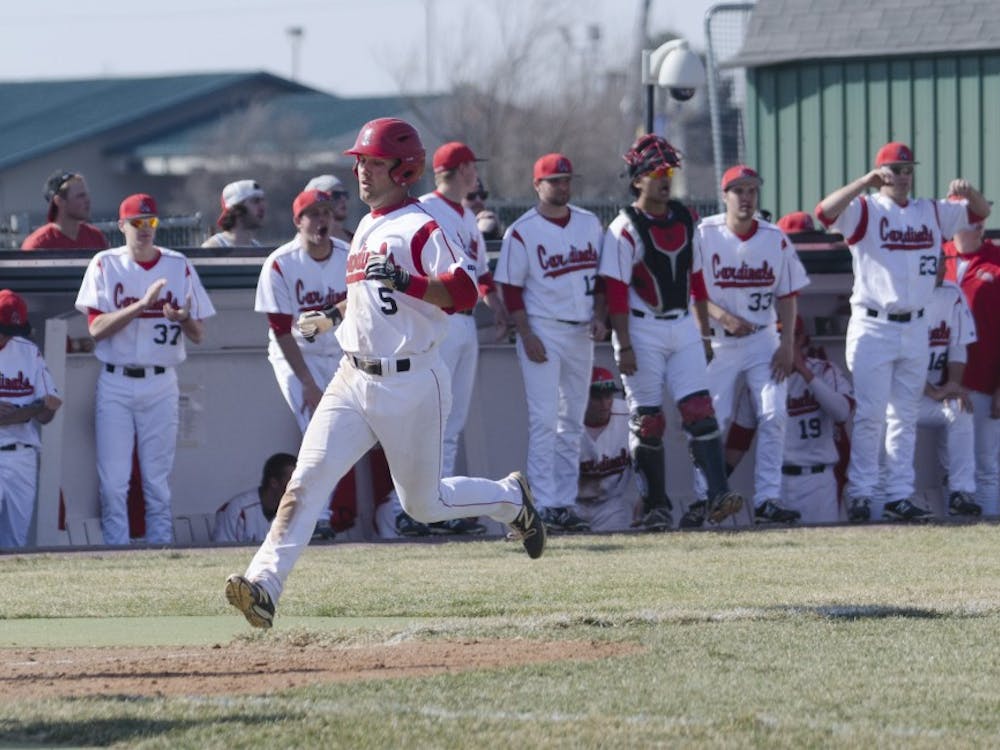 Sophomore infielder Ryan Spaulding runs to the home plate against Bowling Green Friday at Ball Diamond. Ball State won against Bowling Green in all three games this past weekend. DN PHOTO BREANNA DAUGHERTY