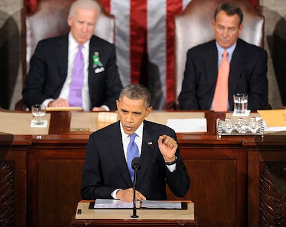 President Barack Obama, accompanied by Vice President Joe Biden and House Speaker John Boehner, gives his State of the Union address during a joint session of Congress on Capitol Hill in Washington, D.C., on Feb. 12, 2013. MCT PHOTO
