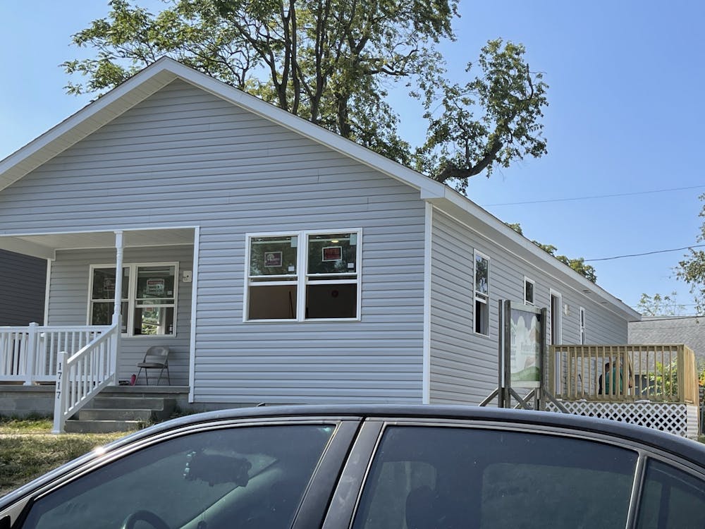 The Tuesday and Thursday construction crew for Habitat for Humanity build one of their newest houses at 1717 S. Jefferson St. on Tuesday, Sept. 28, 2021.