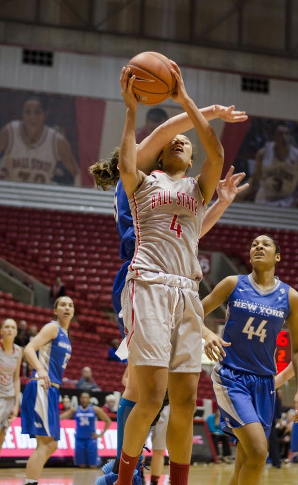 Sophomore guard Nathalie Fontaine goes up for a shot with a Buffalo player defending her in the second half Jan. 26 at Worthen Arena. DN PHOTO BREANNA DAUGHERTY