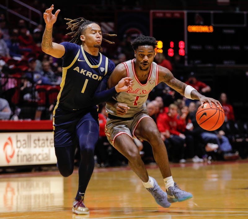 Ball State junior guard Jermarhi Hill dribbles the ball against Akron Feb. 25 at Worthen Arena. Andrew Berger, DN 