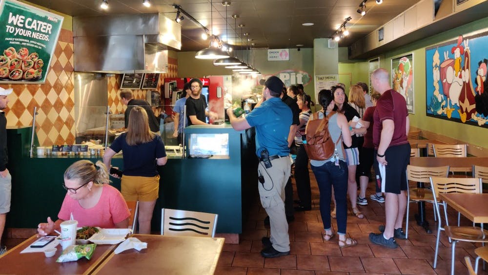 People stop by Pita Pit May 30, 2019, to show their support for the restaurant. The restaurant previously announced that they will be closing, but decided to remain open a little longer due to support from the community. Rohith Rao, DN