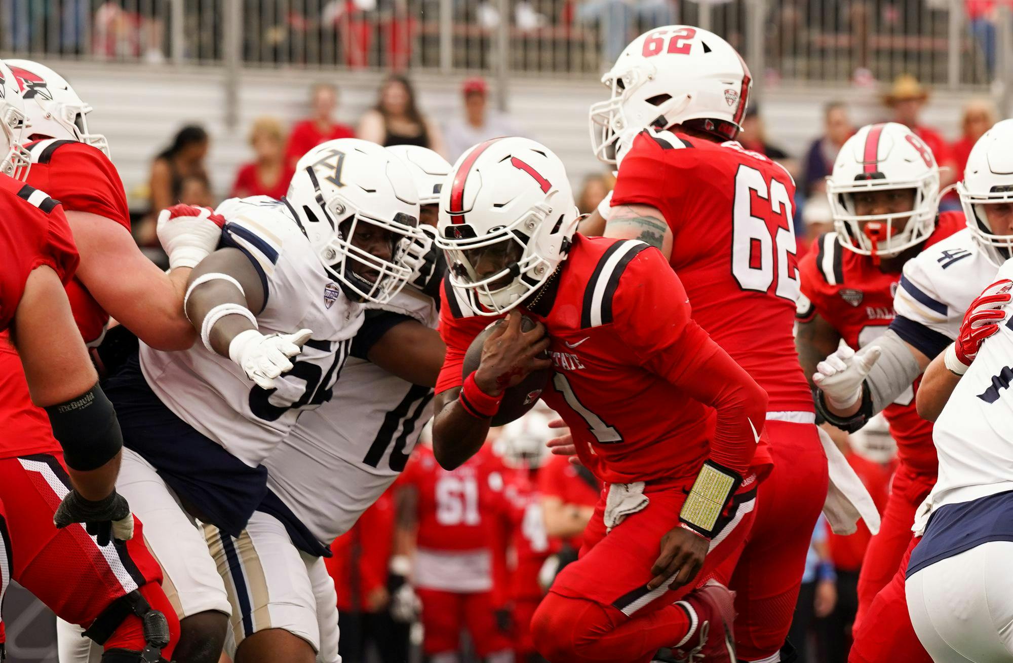 Redshirt quarterback Kiael Kelly runs with the ball against Akron Oct. 18 at Scheumann Stadium. Ball State won 42-28 against Akron. Isabella Kemper, DN