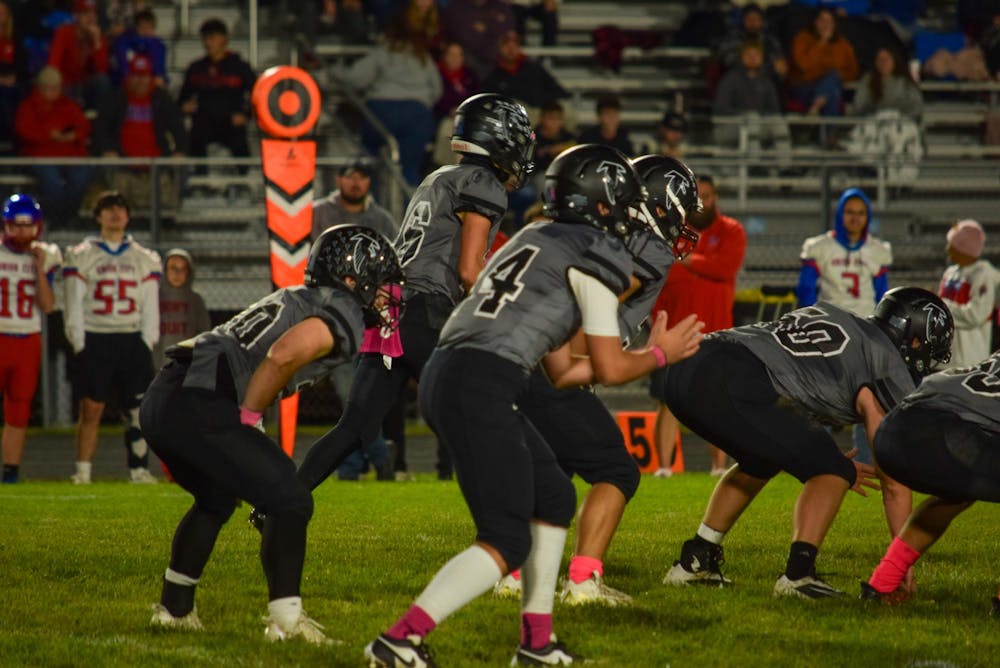 <p>No. 30 Aidan Whitehead and No. 14 Cameron Baldwin in the offensive backfield for the Golden Eagles versus Union City. The Golden Falcons led by these two put up 48 points against the Indians. Photo by: Dane Massey</p>