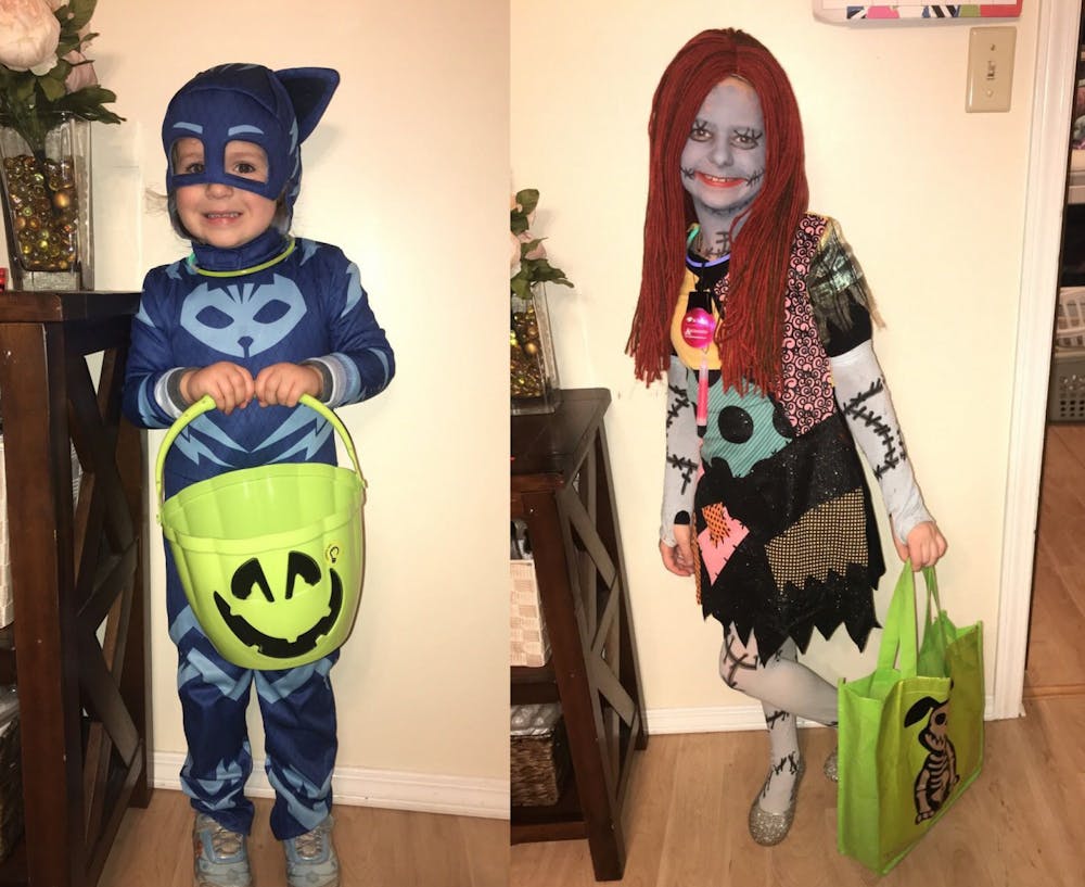 <p>(Left to right) Addison Burns, 4, dresses up as Catboy from the children’s television series, "PJ Masks," and her sister Caitlyn dress up as Sally, the ragdoll from "A Nightmare Before Christmas." Addison is scared of skeletons while Caitlyn is scared of zombies. <strong>Kristy Burns, Photo Provided</strong></p>