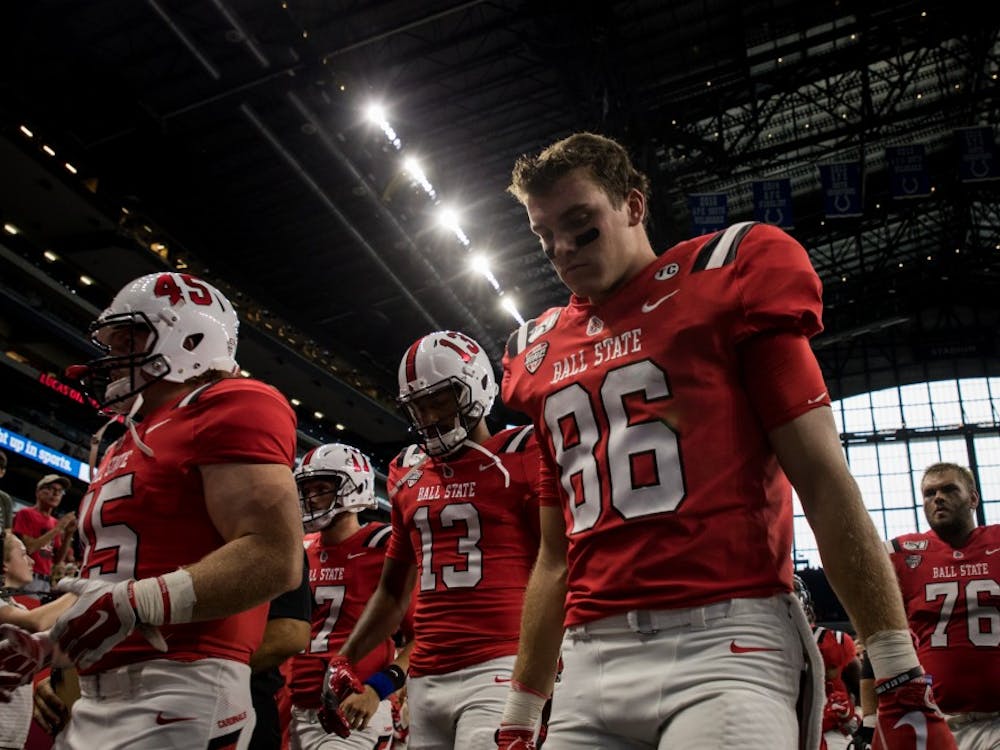 The Ball State football team walks into the locker room Aug. 31, 2019 at Lucas Oil Stadium for half time. The Cardinals played Indiana University for the season opener. Eric Pritchett, DN