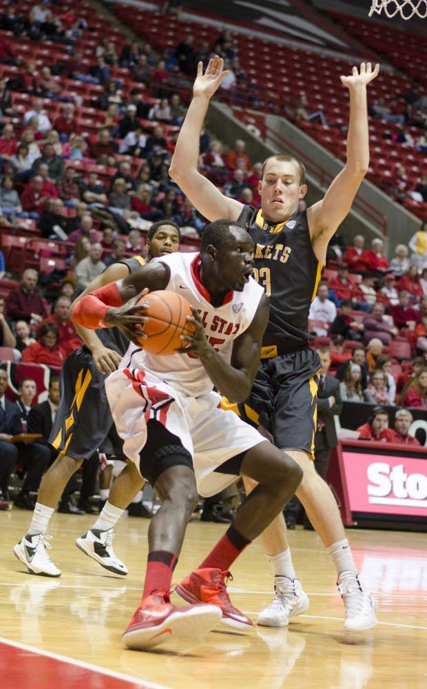 Senior center Majok Majok drives the ball past a Toledo player in the second half Feb. 8 at Worthen Arena. Majok scored 17 points. DN PHOTO BREANNA DAUGHERTY