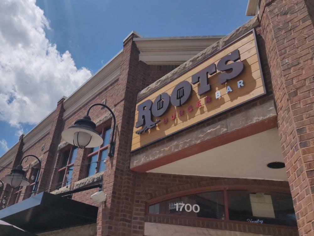 <p>Roots Burger Bar opened June 26, 2019, at the location of what was once the original location of Scotty's Brewhouse. Founder Scott Wise said he decided to open the restaurant in the middle summer to get it prepared for the regular school semester in the fall. <strong>Rohith Rao, DN</strong></p>