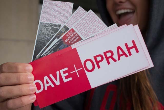 Mackenzie Newman poses with her tickets Saturday morning at the John R. Emens Auditorium Box Office. Newman was one of the first people in line for the tickets. DN PHOTO TAYLOR IRBY