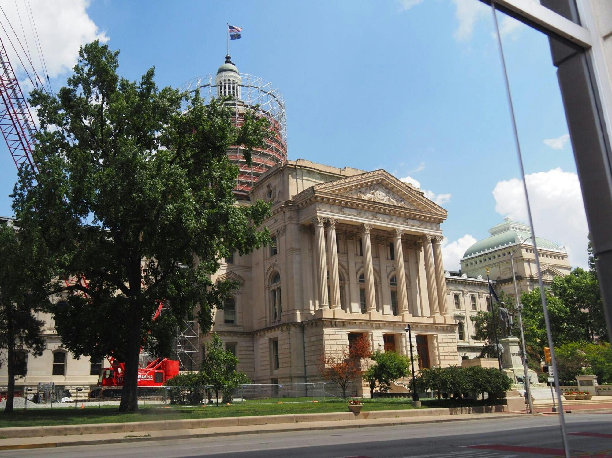 The Indiana Statehouse is reflected in the ISTA building in downtown Indianapolis on Thursday, July 3, 2025. (Leslie Bonilla Muñiz/Indiana Capital Chronicle, photo provided)