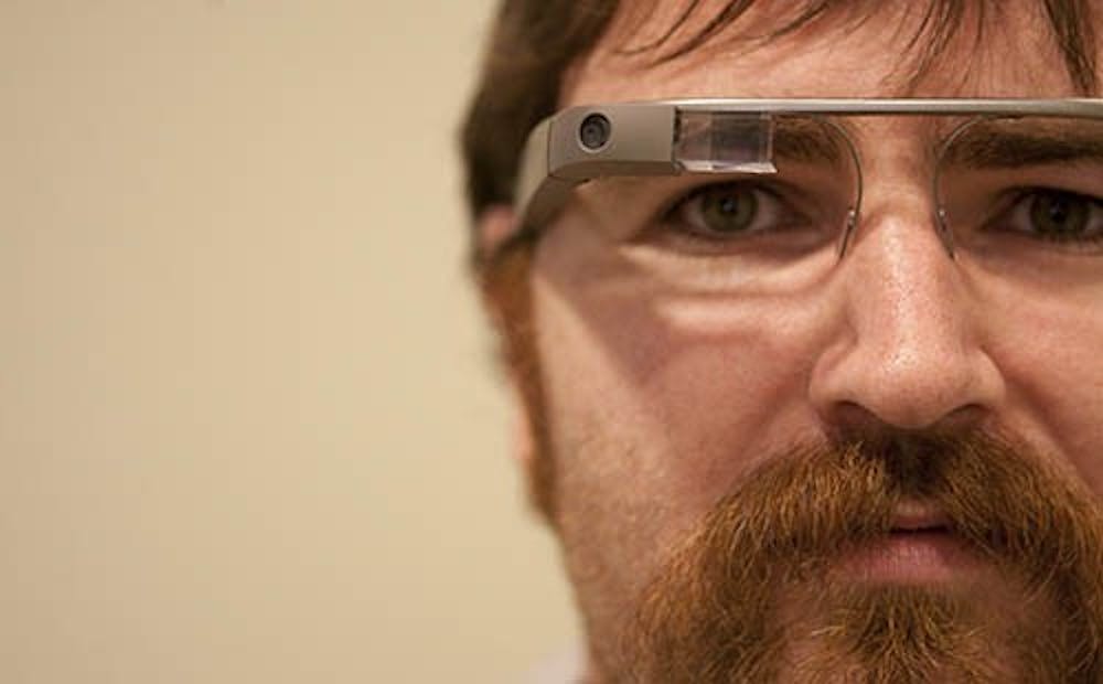 Chris Turvey, of the Ball State iLearn lab, wears Google Glass, a personal computer system. Glass is being beta tested and should be released to the public in a few years. DN FILE PHOTO JORDAN HUFFER