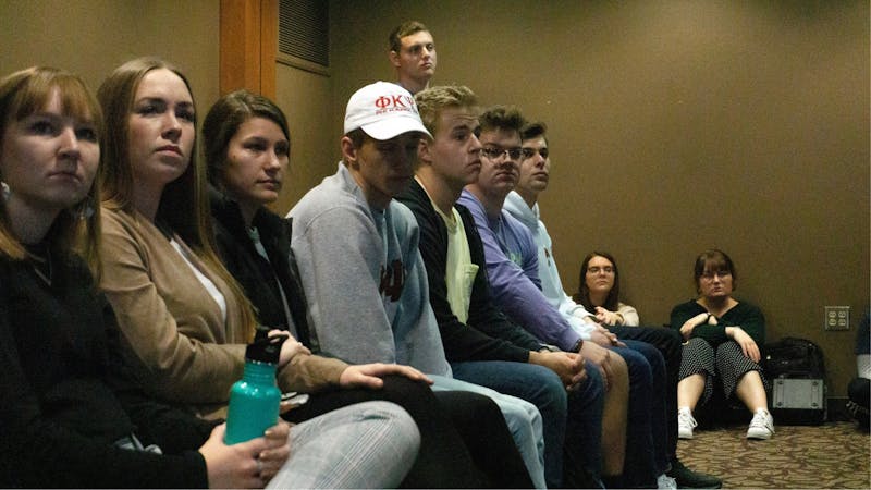 Members of Greek Life organizations look on from the gallery at the Student Government Association (SGA) meeting Nov. 20, 2019, at the L.A. Pittenger Student Center. A resolution was introduced to the SGA that would penalize Greek Life organizations that violate Ball State’s Code of Student Rights and Responsibilities. John Lynch, DN