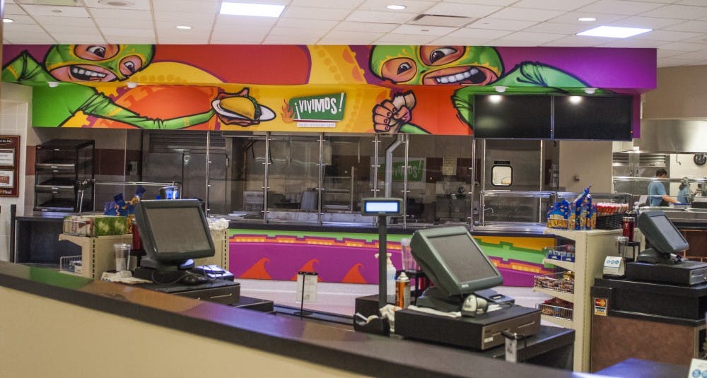 Vivimos sports a new paint scheme courtesy of the FAB crew on Oct. 28. The walls have since been repainted to the taupe color of the rest of the Atrium vendors. DN PHOTO JONATHAN MIKSANEK