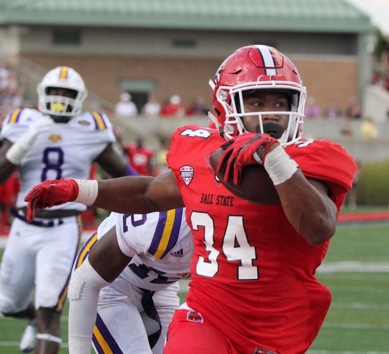 Ball State junior running back James Gilbert runs into the endzone in the second quarter during the Cardinals’ game against Tennessee Tech on Sept. 16 at Scheumann Stadium. Gilbert’s touchdown with 0:09 remaining in the second quarter increased Ball State’s lead to 21-7. Paige Grider, DN File