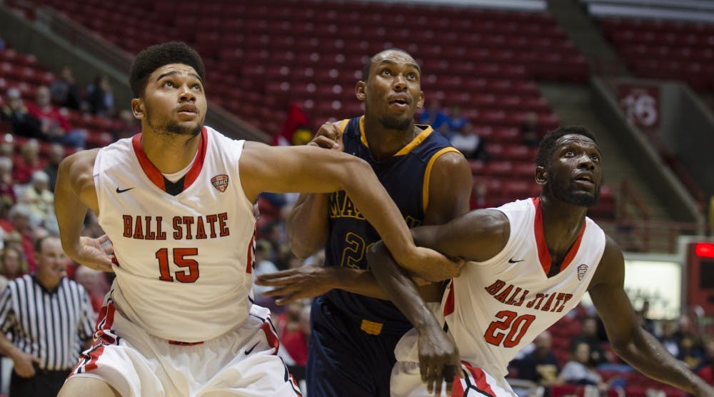 Freshman forward Franko House and senior forward Chris Bond watch the ball after a free throw shot was made by a Marian University player on Nov. 4 at Worthen Arena.  DN PHOTO BREANNA DAUGHERTY
