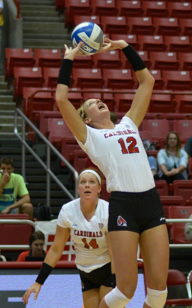 Senior setter Jenna Spadafora sets up a ball in the second game of the Active Ankle Tournament against Belmont on Aug. 28 at Worthen Arena. DN PHOTO BROOK HAYNES