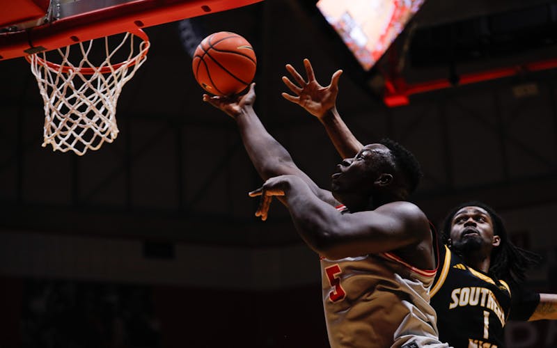 Ball State senior center Payton Sparks puts the ball up for two against Southern Miss Feb. 8 at Worthen Arena. Sparks had four assists in the game. Andrew Berger, DN 