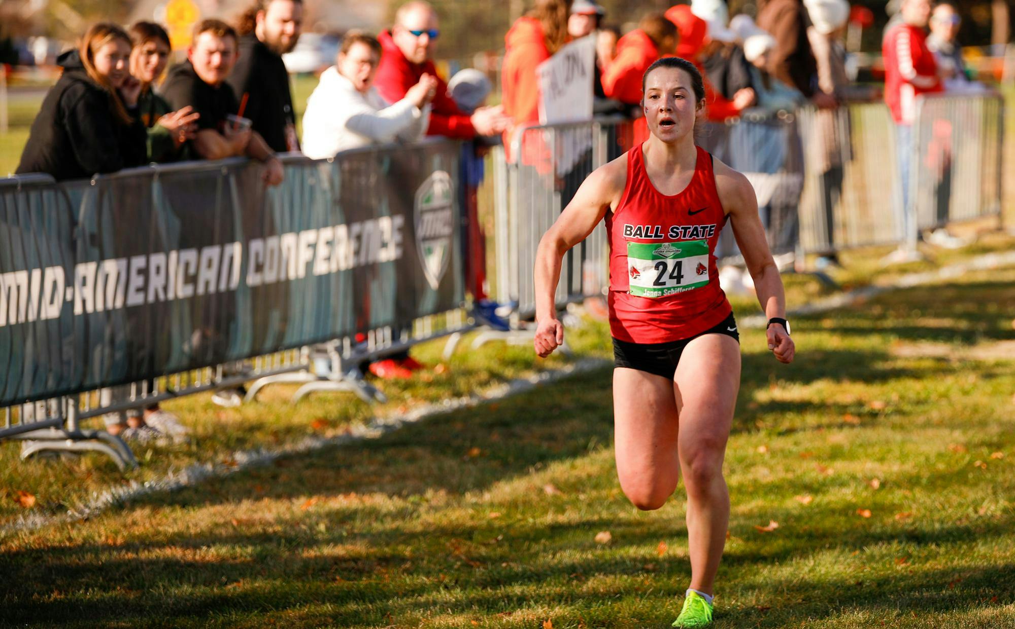 Junior Jenna Schifferer runs into the finish line during the Mid-American Cross Country tournament Nov. 2 at Ball State University. Andrew Berger, DN