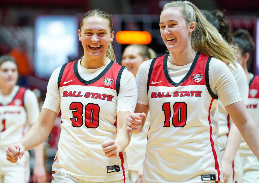 Redshirt-senior Anna Clephane (left) and graduate student Thelma Dis Agustsdottir (right) laughs after the win over Western Michigan Feb. 22 at Worthen Arena. The Cardinals shot 84% from the freethrow line in the win over the Broncos. Brayden Goins, DN