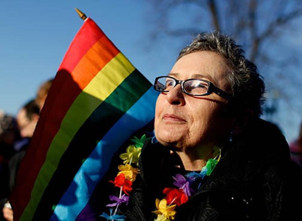 Gail Schulte, of Alexandria, Va., gathers with other demonstrators outside of the U.S. Supreme Court as arguments are heard on California’s Proposition 8 concerning gay marriage on Tuesday. Justice Anthony Kennedy said the case could potentially be dropped by the court, offering no ruling on the case. MCT PHOTO