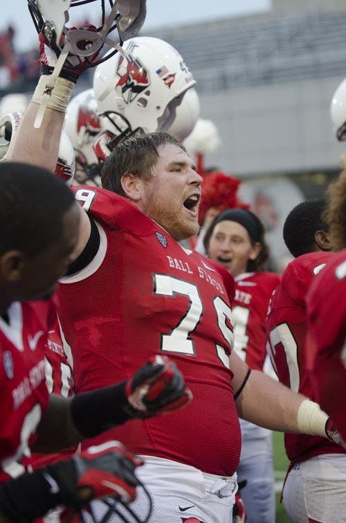 Kitt O’Brien sings Ball State’s fight song after securing a win against Western Michigan for the Homecoming game. DN FILE PHOTO COREY OHLENAKMP