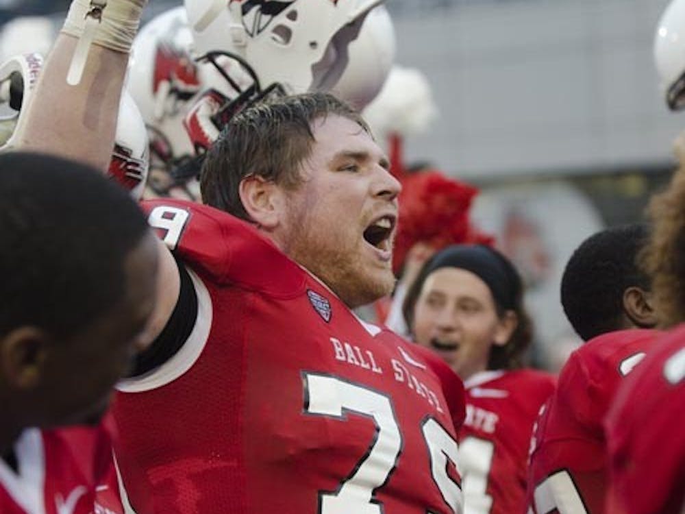 Kitt O’Brien sings Ball State’s fight song after securing a win against Western Michigan for the Homecoming game. DN FILE PHOTO COREY OHLENAKMP