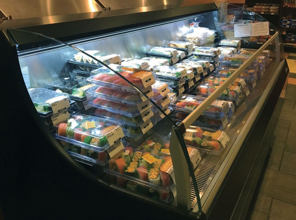 <p>Sushi is stacked to the brim at the Sushi with Gusto stand Jan. 8, 2019, in Woodworth Commons. Ball State Dining expanded its sushi options over winter break and also added ramen, poke bowls and donburi. <strong>Hannah Gunnell, DN</strong></p>